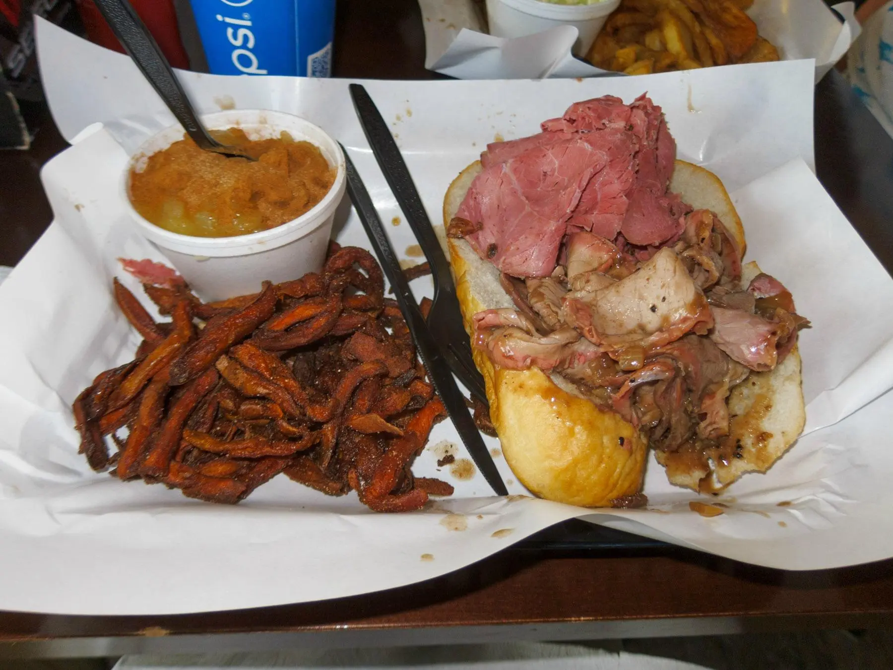 Dalie’s Smokehouse signature dishes Brisket Sandwich, Ultimate Reuben, Pulled Pork.